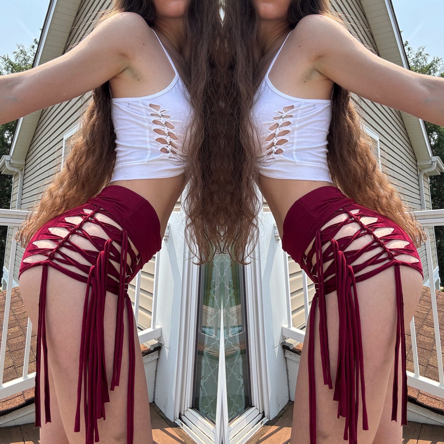 RED BUTTERY SOFT BRAIDED FRINGE SHORTS