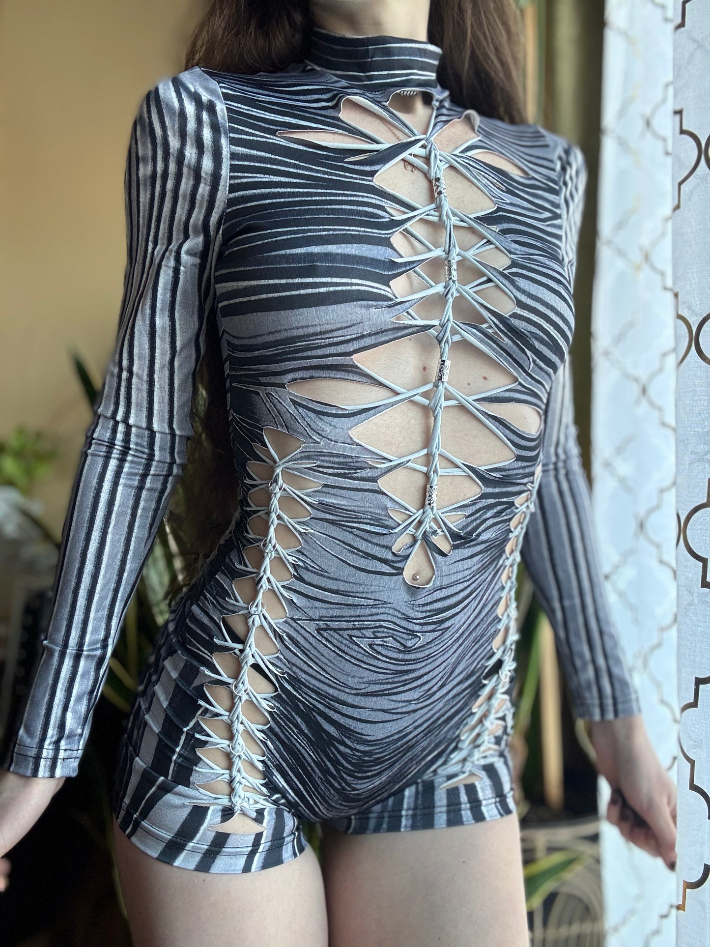 MONOCHROME ZEBRA MOCK NECK LONG SLEEVE BRAIDED ROMPER