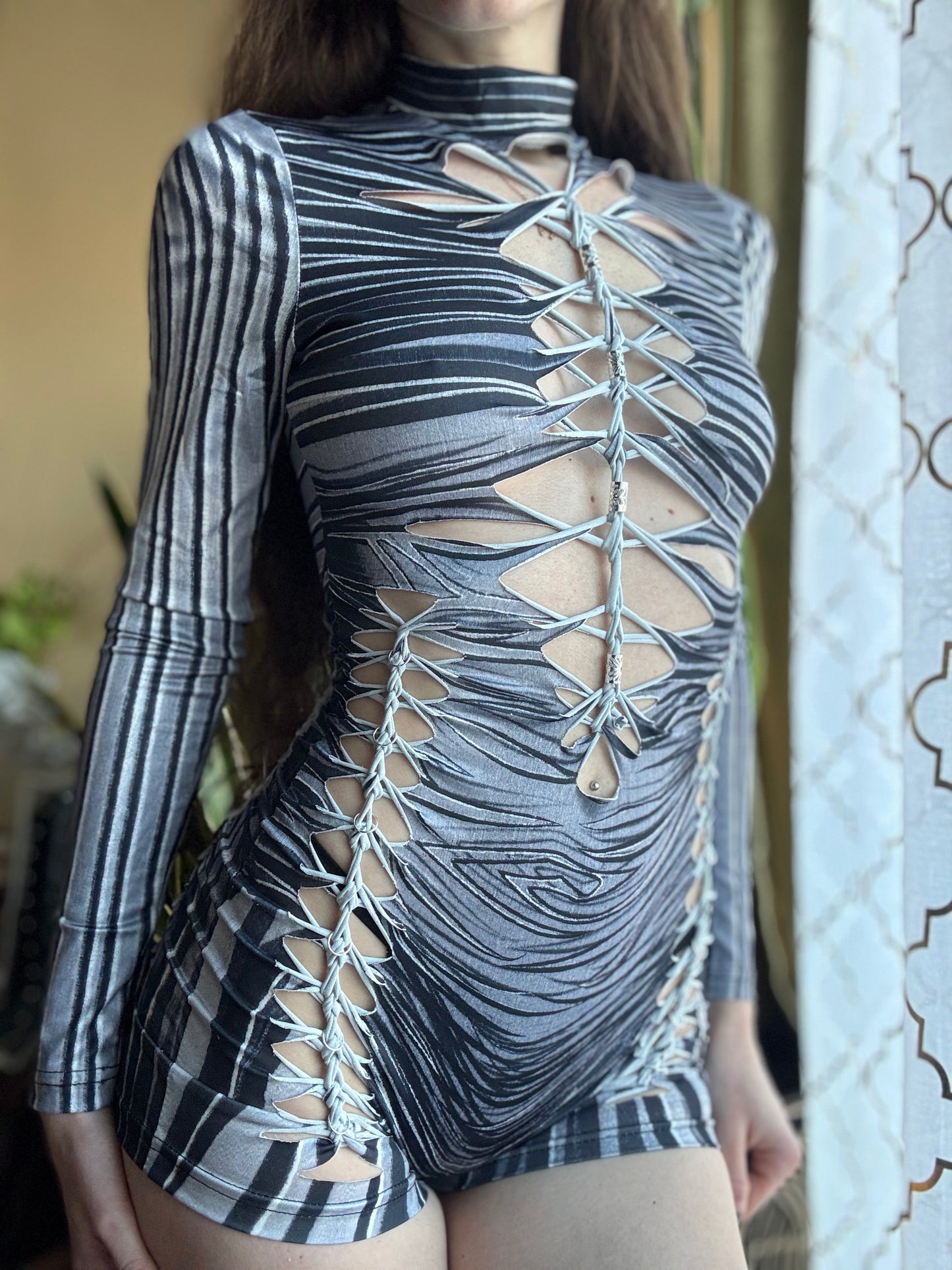 MONOCHROME ZEBRA MOCK NECK LONG SLEEVE BRAIDED ROMPER