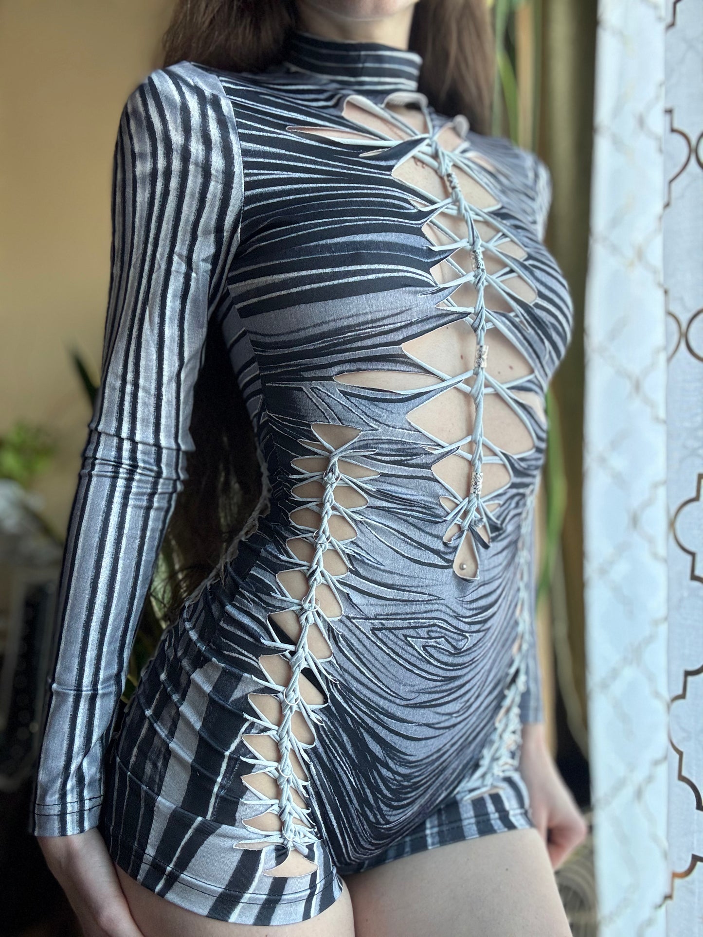 MONOCHROME ZEBRA MOCK NECK LONG SLEEVE BRAIDED ROMPER
