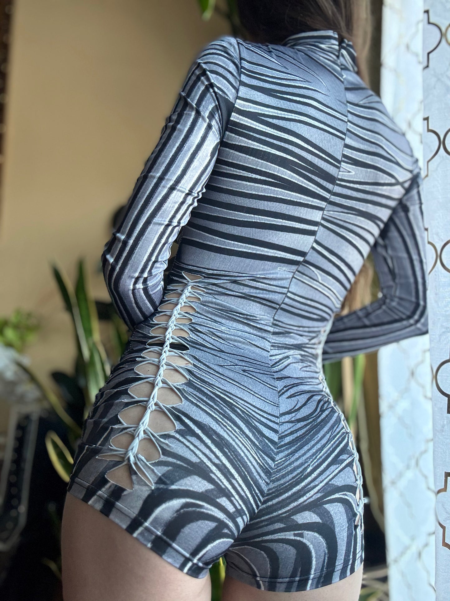 MONOCHROME ZEBRA MOCK NECK LONG SLEEVE BRAIDED ROMPER