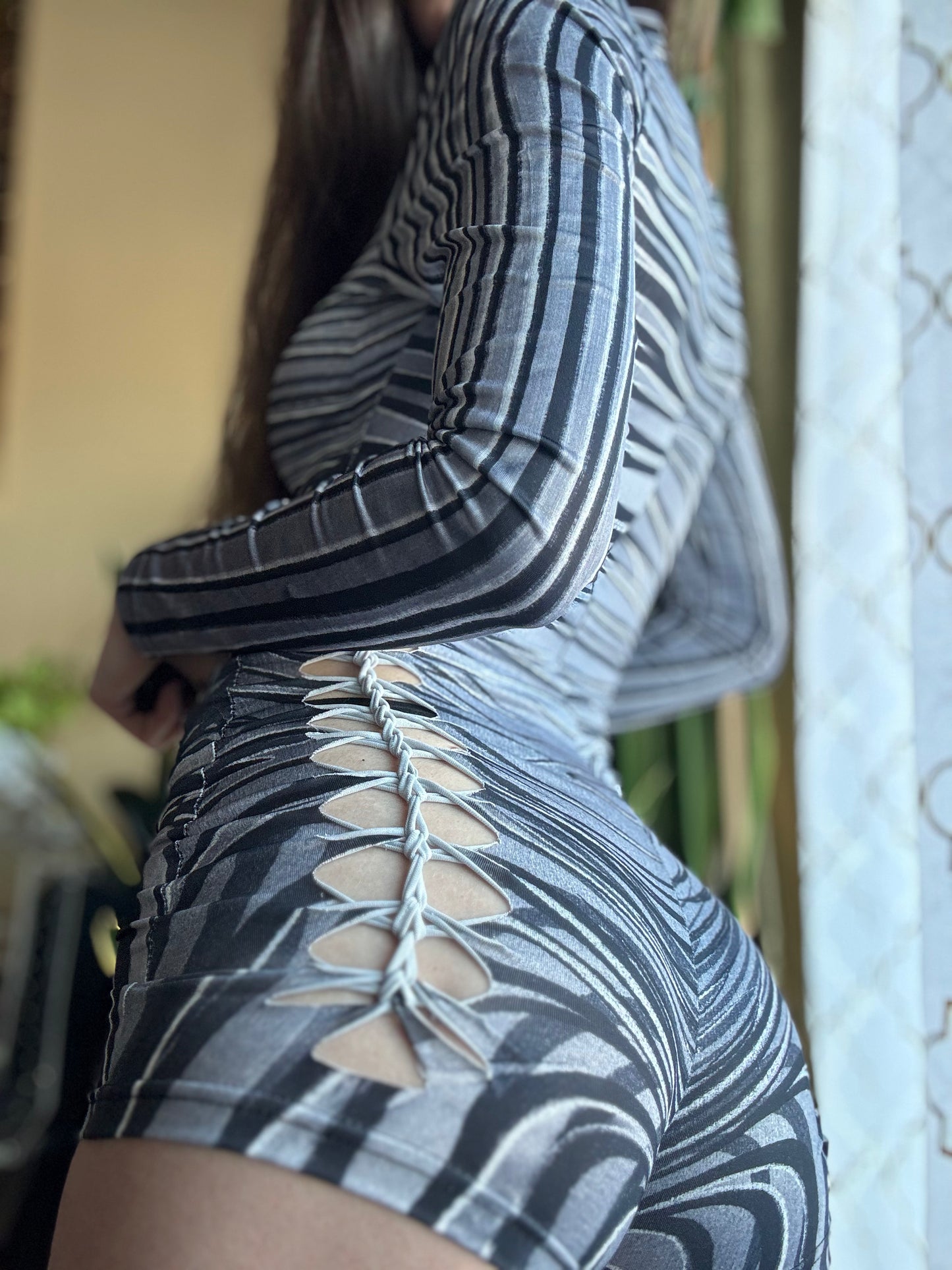 MONOCHROME ZEBRA MOCK NECK LONG SLEEVE BRAIDED ROMPER