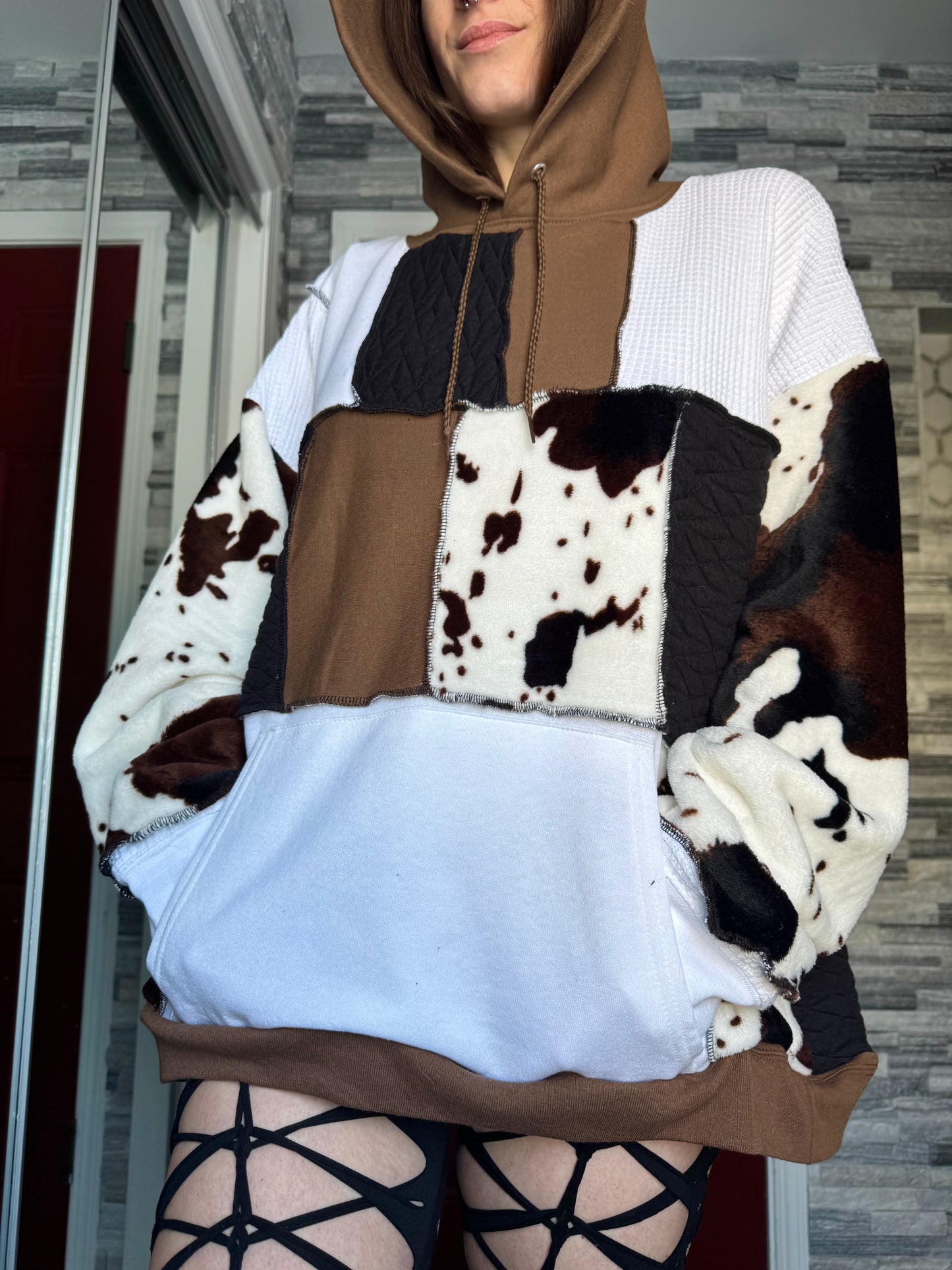 UPCYCLED COW PRINT PATCHWORK HOODIE