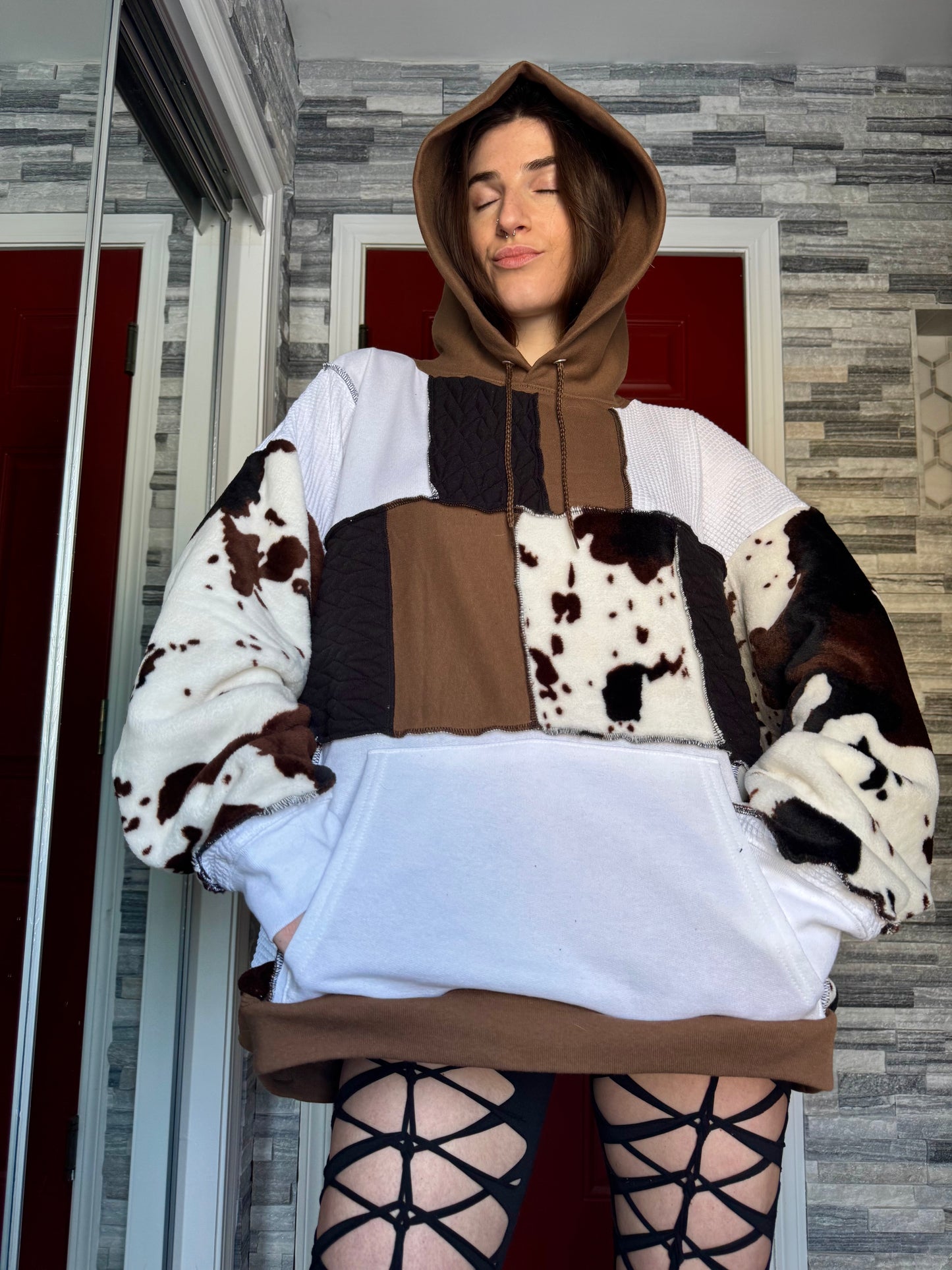 UPCYCLED COW PRINT PATCHWORK HOODIE