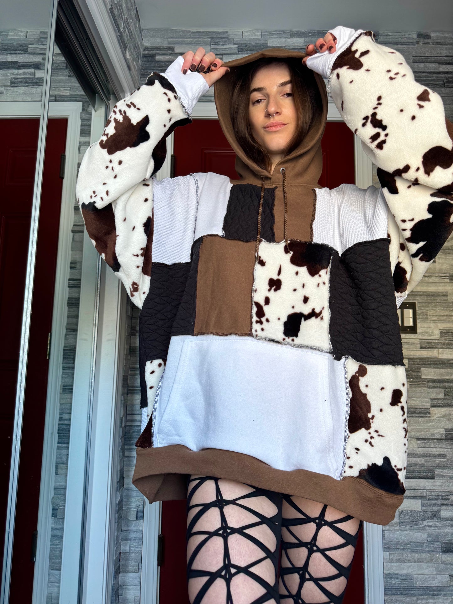 UPCYCLED COW PRINT PATCHWORK HOODIE