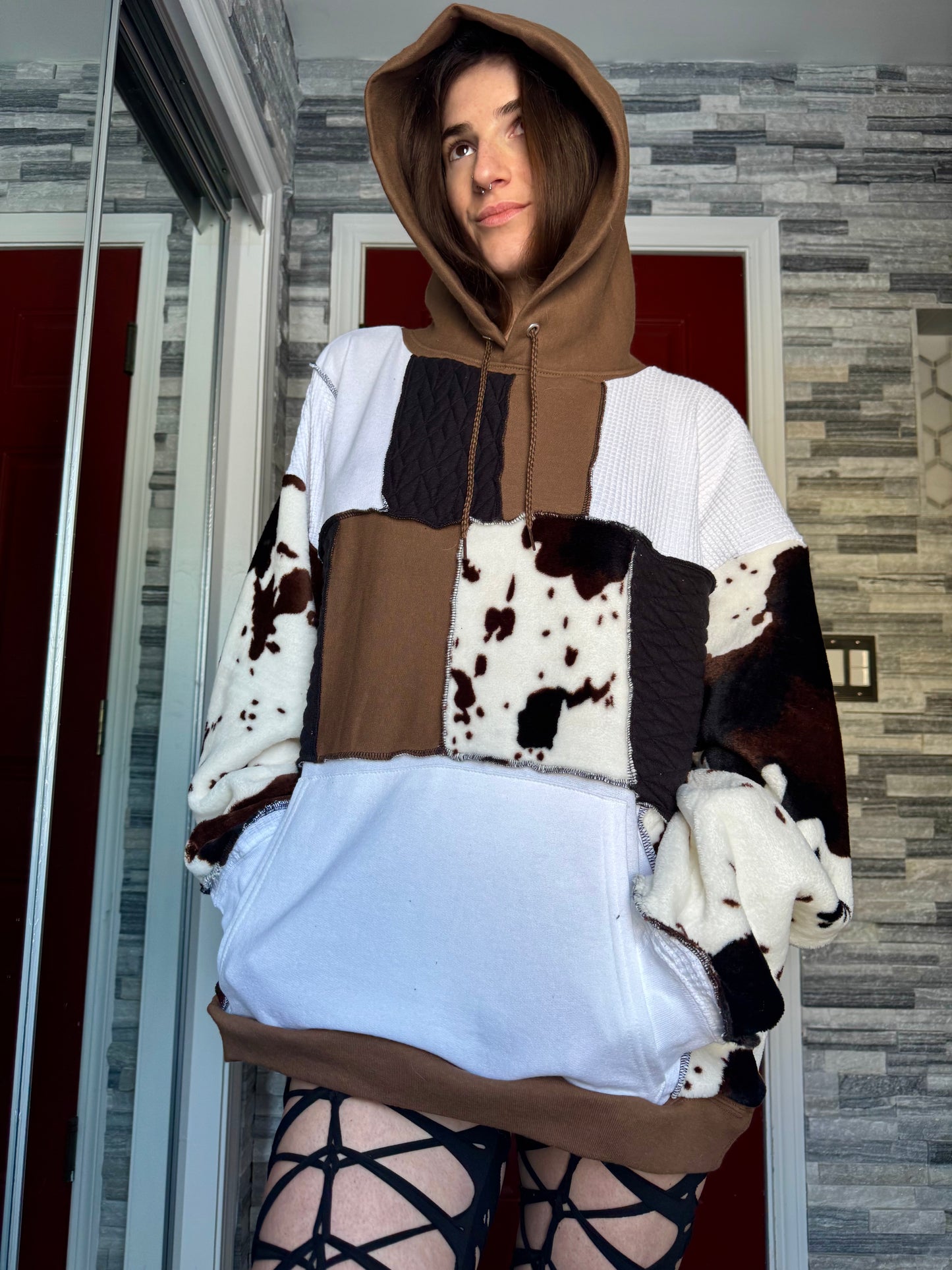 UPCYCLED COW PRINT PATCHWORK HOODIE