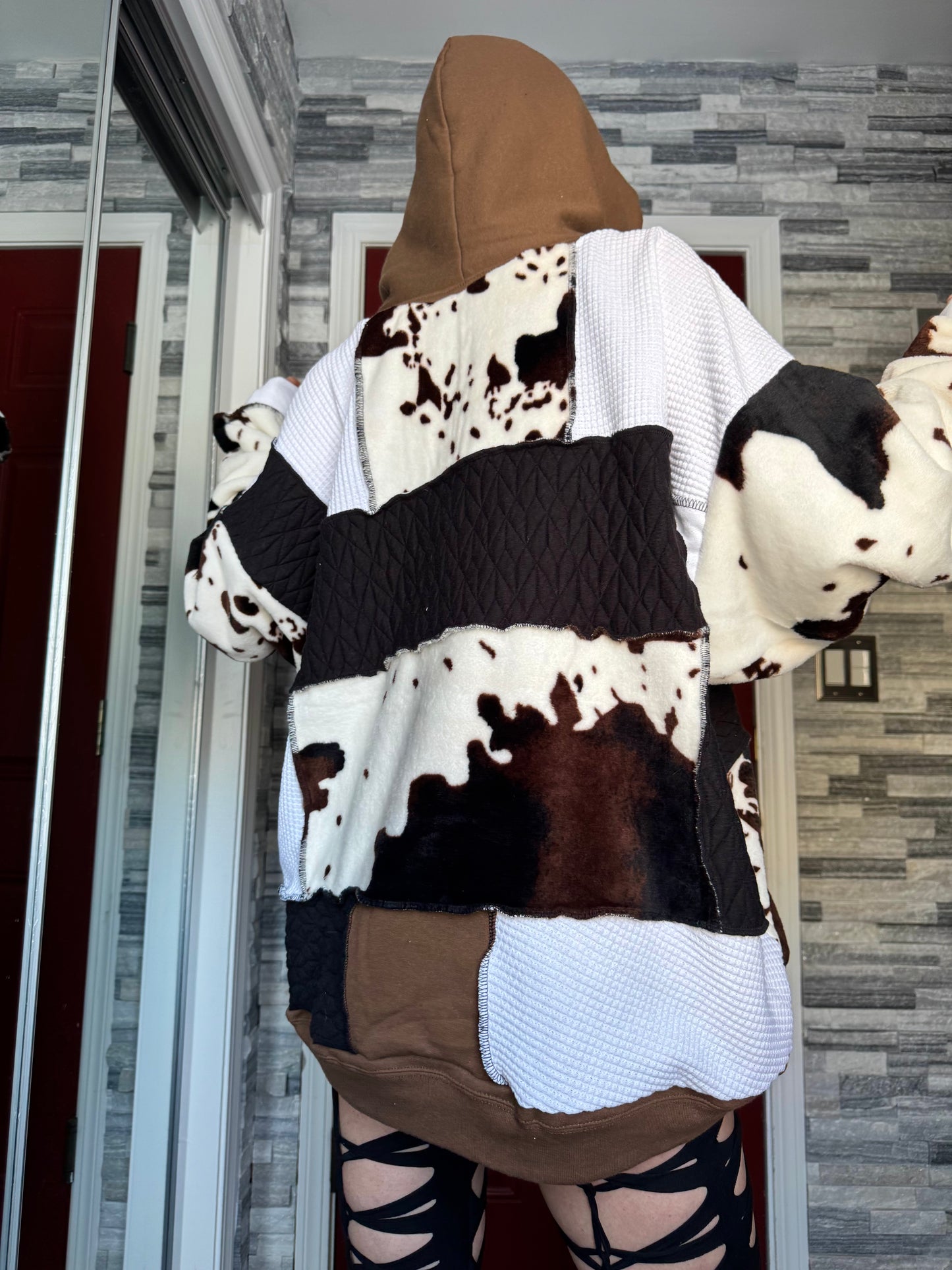UPCYCLED COW PRINT PATCHWORK HOODIE